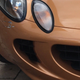 Illustration for article titled Buy This Beautiful Bronze Lotus Elise Totaled Over Bumper Scratch